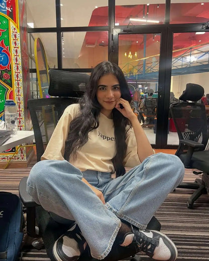 Shanzay wearing yapper tee